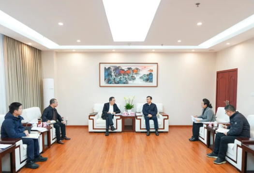 钟承林与水利厅厅长董里一行座谈1